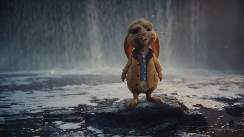 CG hare character in a yellow coat standing on a rock in front of a waterfall